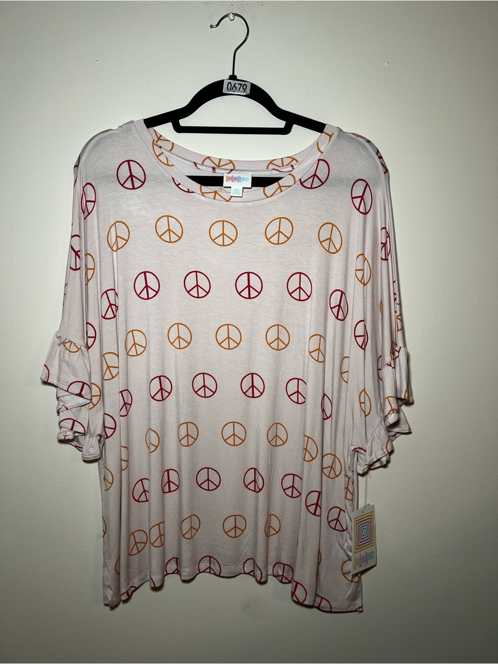 LuLaRoe Dahl Soft Pink Peace Sign Print Women's Top